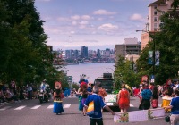 Parade on Lonsdale overlooking Vancouver downtown.
