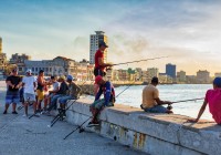 Fishing along the Malecon in the late afternoon