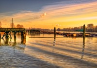 Early morning sunrise on the log booms on the Fraser River in Vancouver