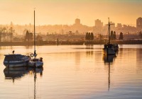 Golden Glow of Sunrise on the boats in False Creek in Vancouver BC