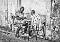 Two Cubans playing chess in the streets of Havana Centro