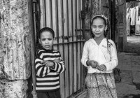 Two children in front of their home in Trinidad Cuba