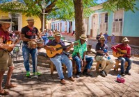 Musicians playing music in square in Trindad Cuba